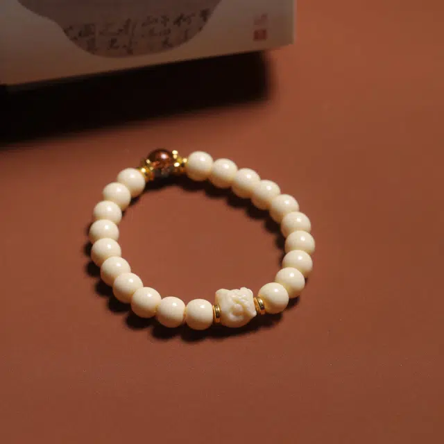嫒柯 国潮新中式 百搭轻奢高级文玩 万事如意 心想事成 财源滚滚 象牙果 手串 男女同款情侣款