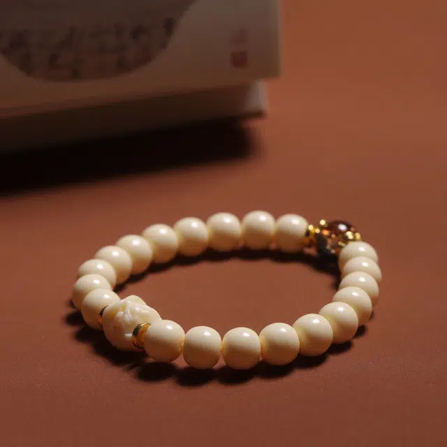 嫒柯 国潮新中式 百搭轻奢高级文玩 万事如意 心想事成 财源滚滚 象牙果 手串 男女同款情侣款