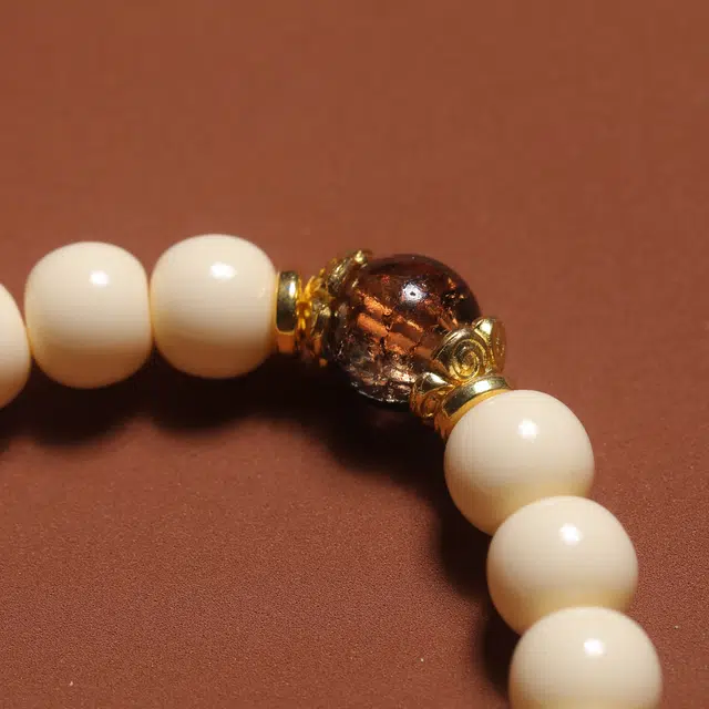 嫒柯 国潮新中式 百搭轻奢高级文玩 万事如意 心想事成 财源滚滚 象牙果 手串 男女同款情侣款