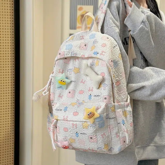 泰格奴 小清新休闲高颜值精美潮版韩版背包初中生高中生大学生上课百搭书包 尼龙 双肩包 女款 米白色/粉红色/天蓝色