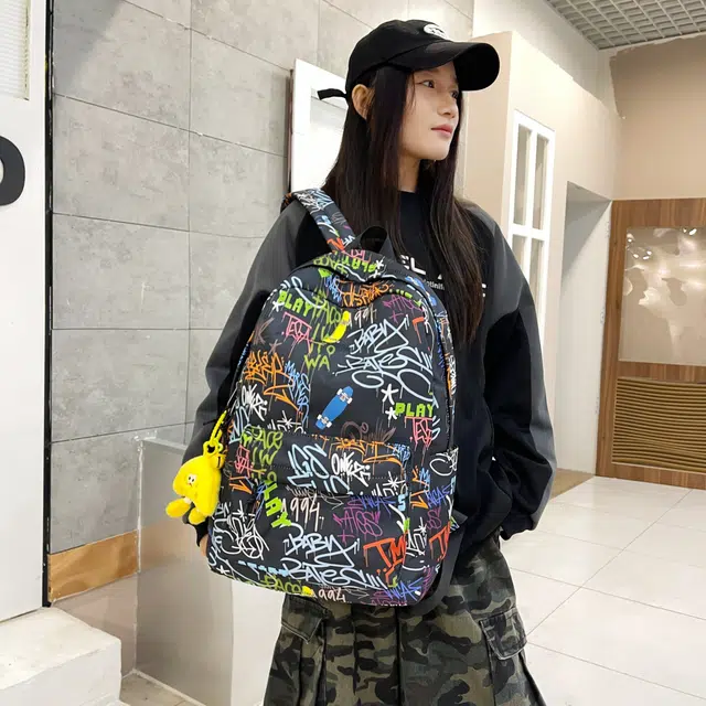 泰格奴 字母印花轻便简约国风大容量运动耐磨背包初中生高中生大学生上课百搭书包 尼龙布 双肩包 男女同款情侣款 蓝色/黑色