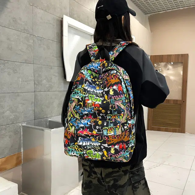 泰格奴 小清新休闲高颜值韩版背包初中生高中生大学生上课百搭书包 尼龙布 双肩包 男女同款情侣款 彩色/灰色/黑色