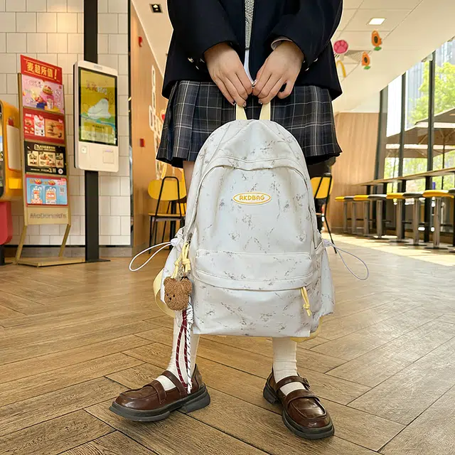 泰格奴 小清新休闲高颜值精美潮版韩版背包初高中生大学生上课百搭书包 尼龙 双肩包 男女同款情侣款 米白色/黑色/黄色/蓝色