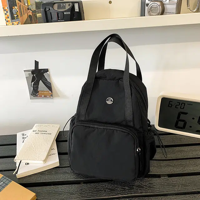 泰格奴 简约日系纯色休闲通勤旅行轻便高颜值大容量背包初中高中大学上课百搭书包 尼龙 双肩包 男女同款情侣款 黑色/黄色/卡其色/军绿色