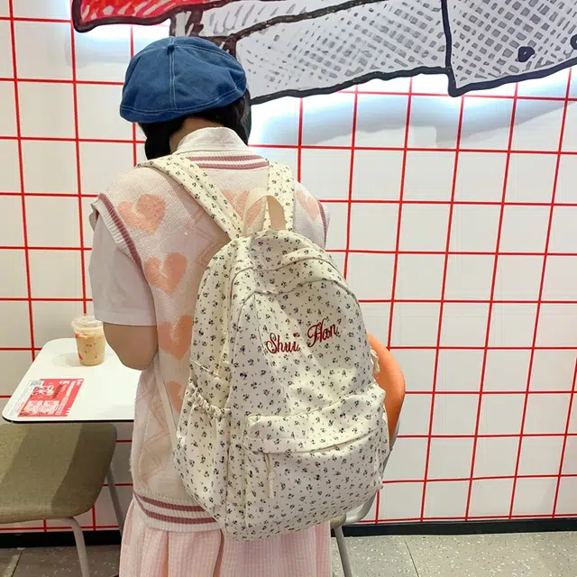 泰格奴 潮流轻便百搭简约时尚通勤高颜值大容量 尼龙 双肩包 女款 蓝色花朵/红色花朵