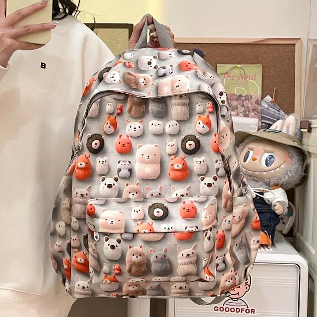 泰格奴 涂鸦精美机能通勤旅行小清新大容量背包初中高中大学生上课百搭书包 尼龙 双肩包 男女同款情侣款 灰色/浅黄色/绿色/蓝色
