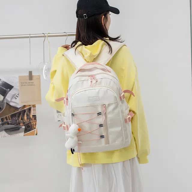 泰格奴 小清新休闲高颜值精美潮版韩版背包初中生高中生大学生上课百搭书包 尼龙 双肩包 男女同款情侣款 米白色/粉红色/黑色