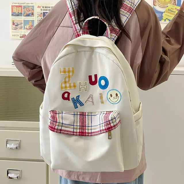 泰格奴 字母印花轻便简约国风大容量运动耐磨背包初中生高中生大学生上课百搭书包 尼龙 双肩包 女款 白色绿色黄色蓝色