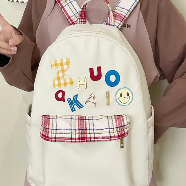 泰格奴 字母印花轻便简约国风大容量运动耐磨背包初中生高中生大学生上课百搭书包 尼龙 双肩包 女款 白色绿色黄色蓝色