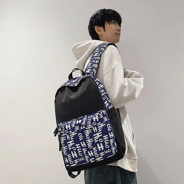 泰格奴 涂鸦精美机能通勤旅行小清新轻便高颜值大容量背包初中高中大学生上课百搭书包 尼龙 双肩包 男女同款情侣款 蓝色/花色/红色/黑色