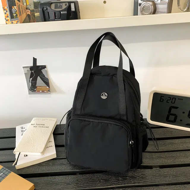 泰格奴 简约日系纯色休闲通勤旅行轻便高颜值大容量背包初中高中大学上课百搭书包 尼龙 双肩包 男女同款情侣款 黑色/黄色/卡其色/军绿色
