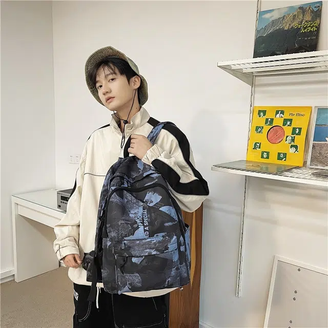 泰格奴 简约休闲百搭高级感街头休闲初高中大学生毕业季旅游上课书包 尼龙 双肩包 男女同款情侣款 灰蓝色/粉红色/浅蓝色/浅灰色/浅绿色