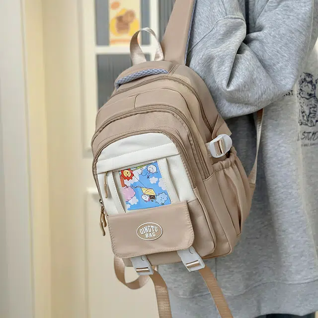 泰格奴 时尚百搭休闲通勤旅行个性风格独特背包初中生高中生大学生上课百搭书包 尼龙 双肩包 男女同款情侣款 卡其色蓝色黑色红色黄色