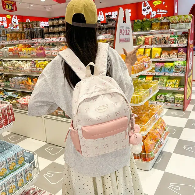 泰格奴 小清新休闲高颜值精美潮版韩版背包初中生高中生大学生上课百搭书包 尼龙布 双肩包 男女同款情侣款 粉色/黄色/绿色/黑色