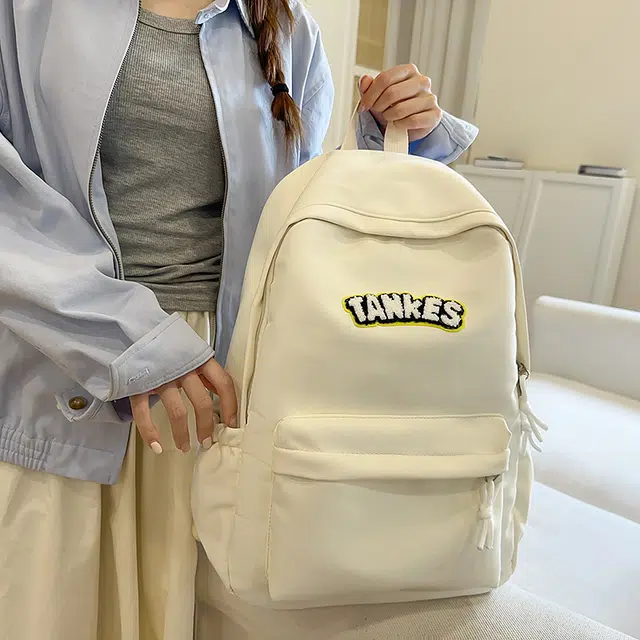 泰格奴 高颜值时尚复古简约百搭个性潮酷学院风通勤大容量轻便 尼龙 双肩包 男女同款情侣款 乳白色/黑色/红色/黄色