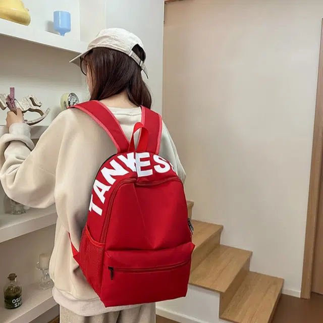 泰格奴 日系初高中大学生毕业季旅游书包简约轻便外出纯色百搭背包女生 尼龙 双肩包 男女同款情侣款 红色/紫色/黄色/黑色/浅灰色/粉红色