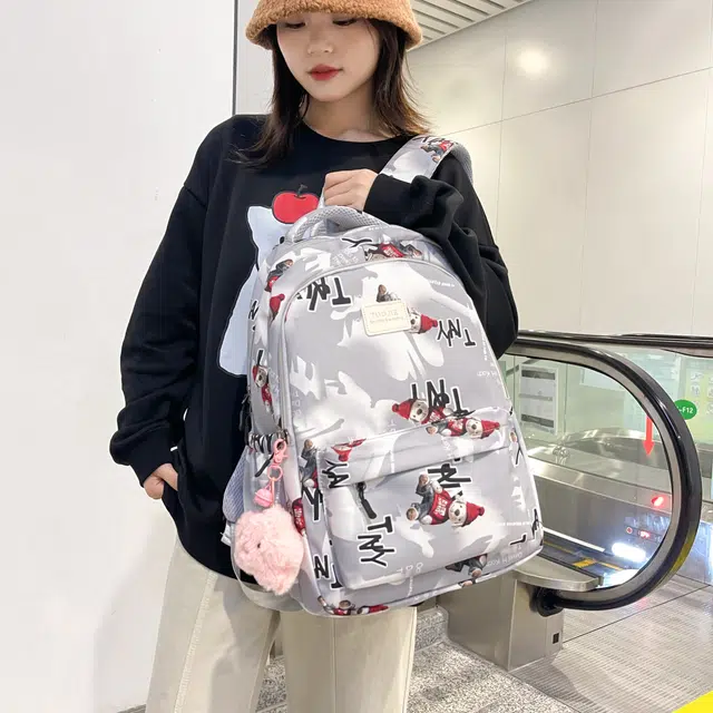 泰格奴 涂鸦精美旅行小清新轻便高颜值大容量背包初中高中大学生上课百搭书包 尼龙 双肩包 常规 男女同款情侣款 灰色/蓝色/黑色