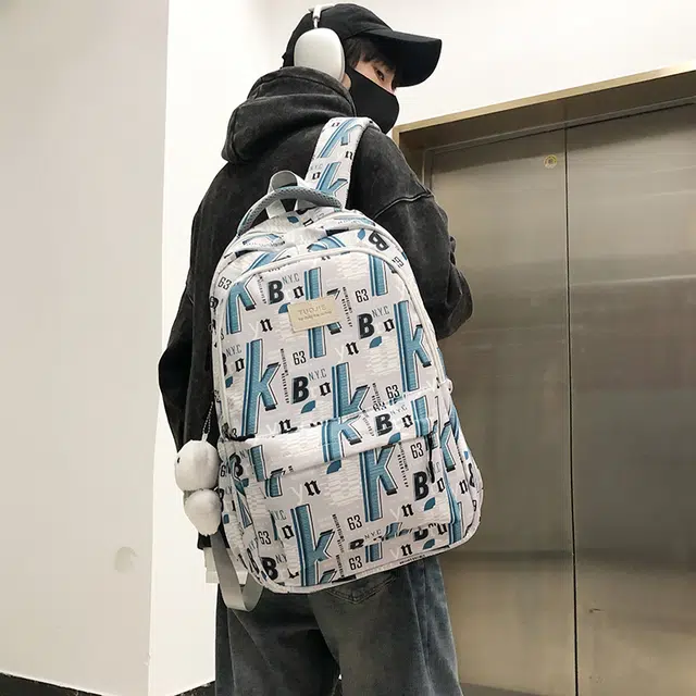 泰格奴 字母印花轻便简约大容量运动耐磨背包初中生高中生大学生上课百搭书包 尼龙 双肩包 男女同款情侣款 蓝色/绿色/黑色