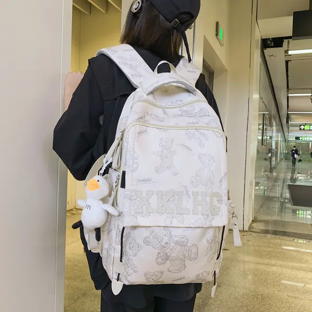 泰格奴 字母印花轻便国风大容量运动背包初中生高中生大学生上课百搭书包 尼龙 双肩包 男女同款情侣款 米白色/黑色/红色/绿色