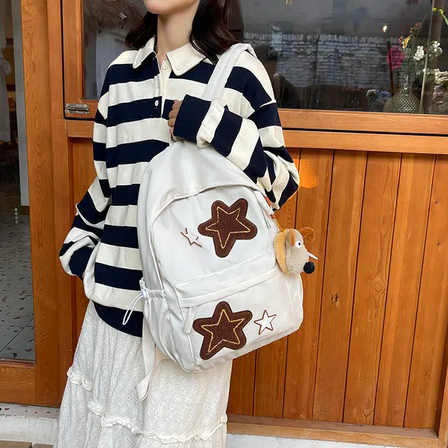 泰格奴 小清新休闲高颜值精美星星韩版背包初中生高中生大学生上课百搭书包 尼龙 双肩包 常规 女款 白色/黄色/蓝色/桔色/黑色