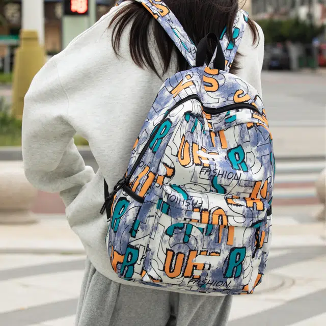 泰格奴 字母印花轻便简约大容量运动耐磨背包初中生高中生大学生上课百搭书包 尼龙 双肩包 男女同款情侣款 卡其色/紫色/蓝色/黑色