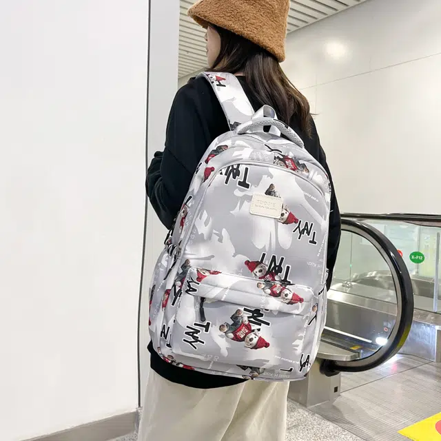 泰格奴 涂鸦精美旅行小清新轻便高颜值大容量背包初中高中大学生上课百搭书包 尼龙 双肩包 常规 男女同款情侣款 灰色/蓝色/黑色