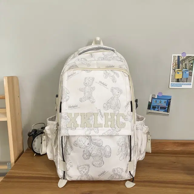 泰格奴 字母印花轻便国风大容量运动背包初中生高中生大学生上课百搭书包 尼龙 双肩包 男女同款情侣款 米白色/黑色/红色/绿色