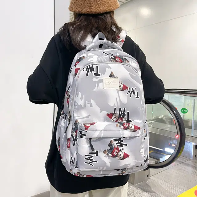 泰格奴 涂鸦精美旅行小清新轻便高颜值大容量背包初中高中大学生上课百搭书包 尼龙 双肩包 常规 男女同款情侣款 灰色/蓝色/黑色