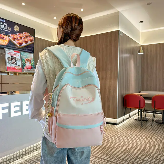泰格奴 撞色系轻便百搭背包气质高级感潮流时尚初中高中大学生上课书包 尼龙 双肩包 男女同款情侣款 粉色/蓝色/红色/棕色