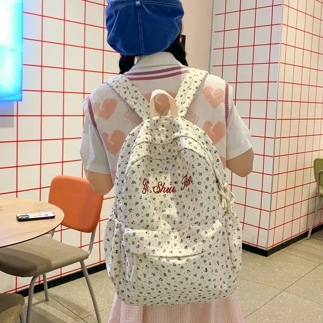 泰格奴 潮流轻便百搭简约时尚通勤高颜值大容量 尼龙 双肩包 女款 蓝色花朵/红色花朵