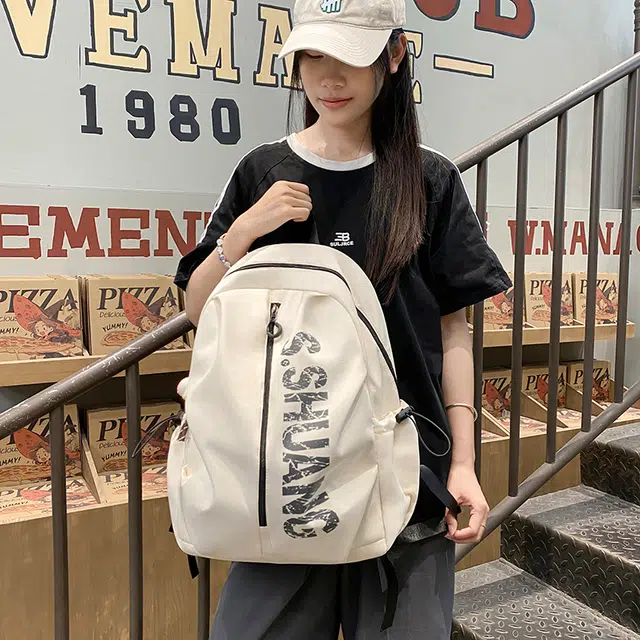泰格奴 小清新休闲高颜值精美潮版韩版背包初高中生大学上课百搭 尼龙 双肩包 男女同款情侣款 米白色/黑色