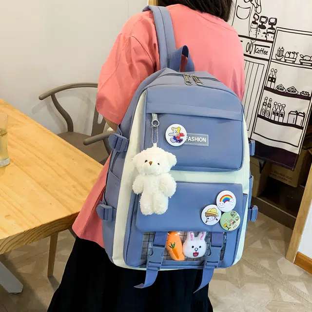 泰格奴 小清新休闲高颜值韩版背包初中生高中生大学生上课百搭书包 帆布 双肩包 男女同款情侣款 蓝色/粉色/紫色/黑色