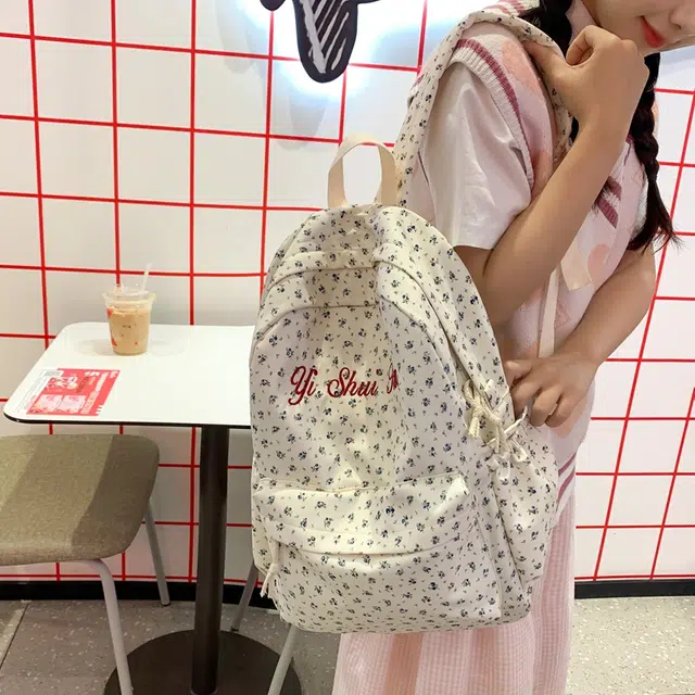 泰格奴 潮流轻便百搭简约时尚通勤高颜值大容量 尼龙 双肩包 女款 蓝色花朵/红色花朵