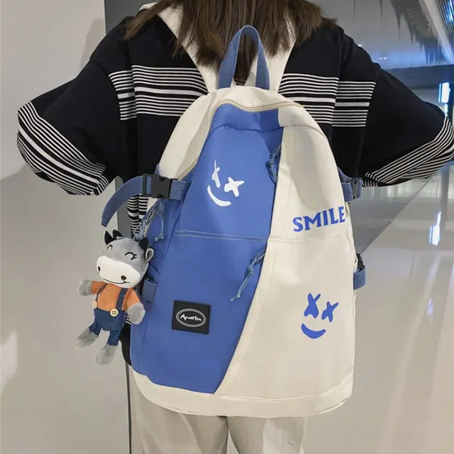 泰格奴 撞色系轻便百搭背包美版韩流洋气个性气质高级感潮流时尚初中高中大学生上课百搭书包 尼龙 双肩包 男女同款情侣款 白色/黑色