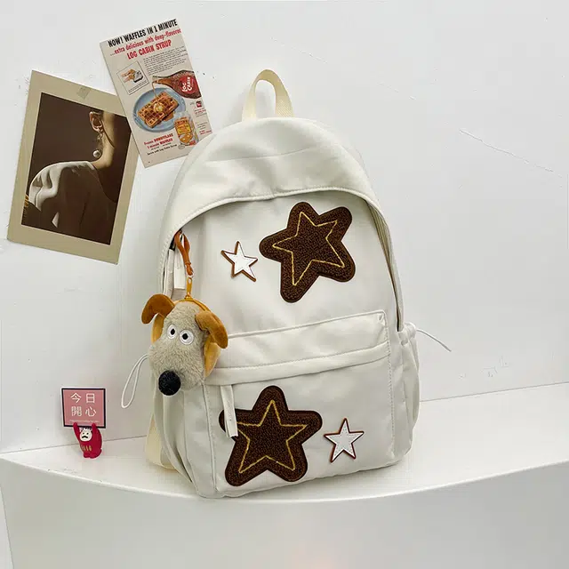 泰格奴 小清新休闲高颜值精美星星韩版背包初中生高中生大学生上课百搭书包 尼龙 双肩包 常规 女款 白色/黄色/蓝色/桔色/黑色