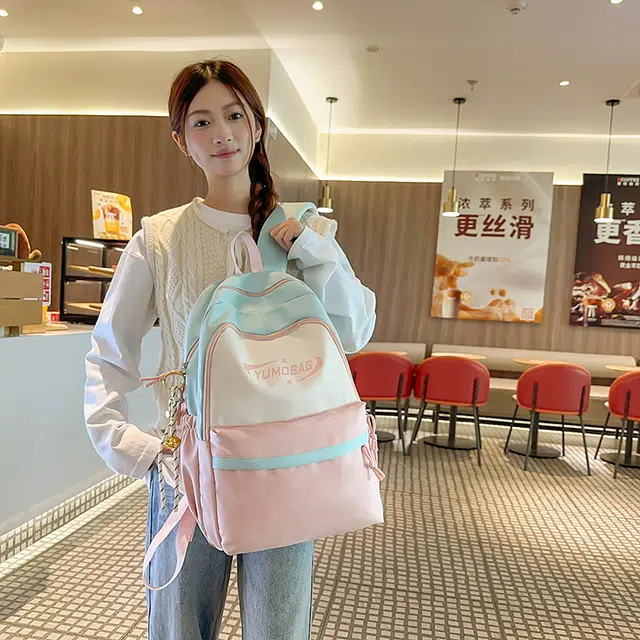 泰格奴 撞色系轻便百搭背包气质高级感潮流时尚初中高中大学生上课书包 尼龙 双肩包 男女同款情侣款 粉色/蓝色/红色/棕色