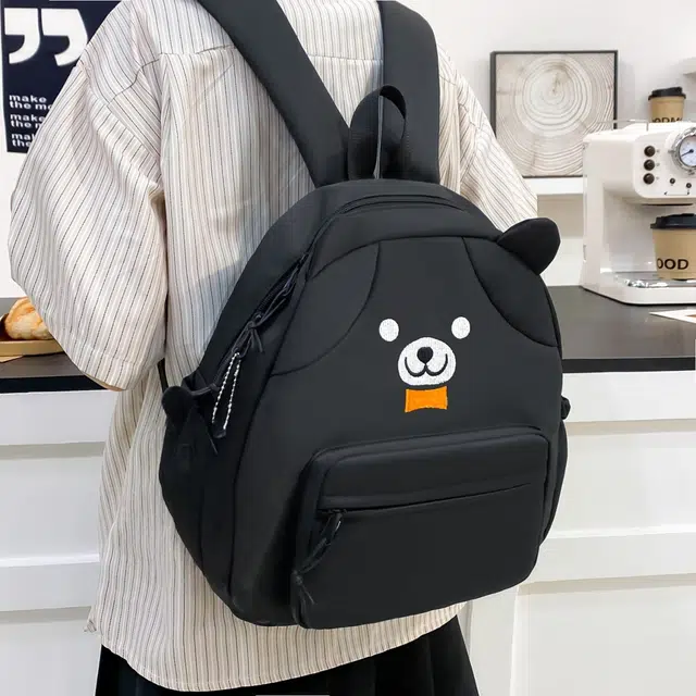 泰格奴  时尚简约日系高颜值可爱大容量卡通小熊高中生大学生书包小清新旅游出游  尼龙 双肩包 男女同款情侣款 黑色/黄色/白色