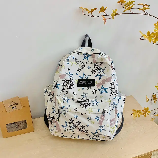 泰格奴 小清新休闲高颜值精美潮版韩版背包初中生高中生大学生上课百搭书包 尼龙布 双肩包 男女同款情侣款 白色