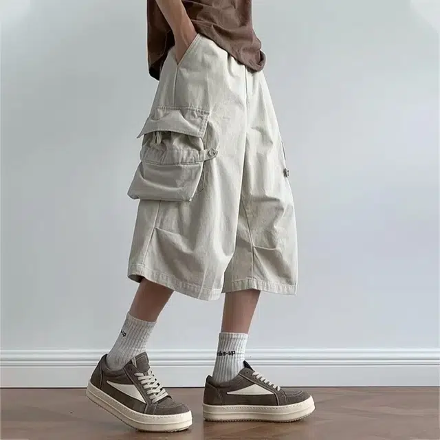 冈哉 褶皱拼接多口袋飘带设计美式高街户外运动宽松阔腿五分裤日常通勤高级感休闲短裤 男女同款