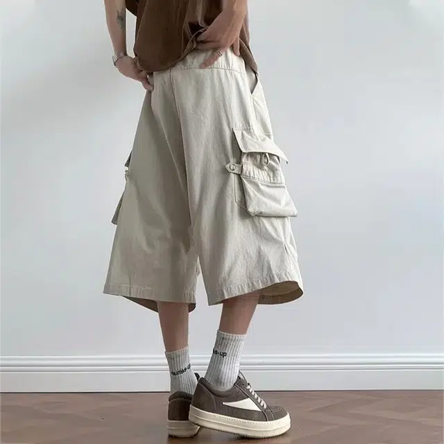 冈哉 褶皱拼接多口袋飘带设计美式高街户外运动宽松阔腿五分裤日常通勤高级感休闲短裤 男女同款