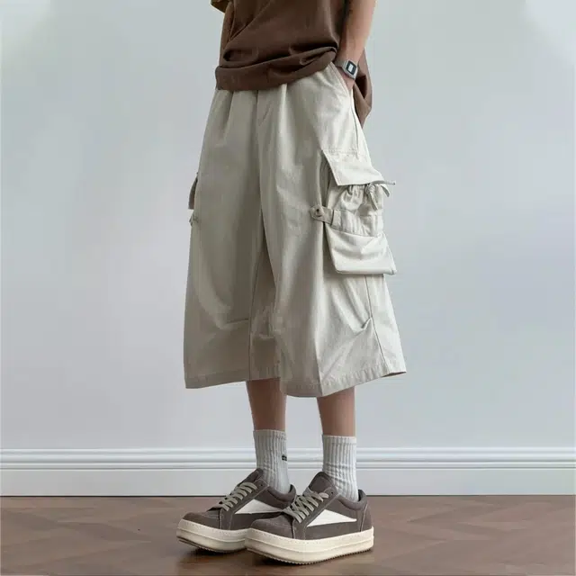冈哉 褶皱拼接多口袋飘带设计美式高街户外运动宽松阔腿五分裤日常通勤高级感休闲短裤 男女同款