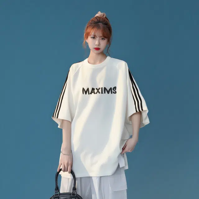 maxim's de paris logoT