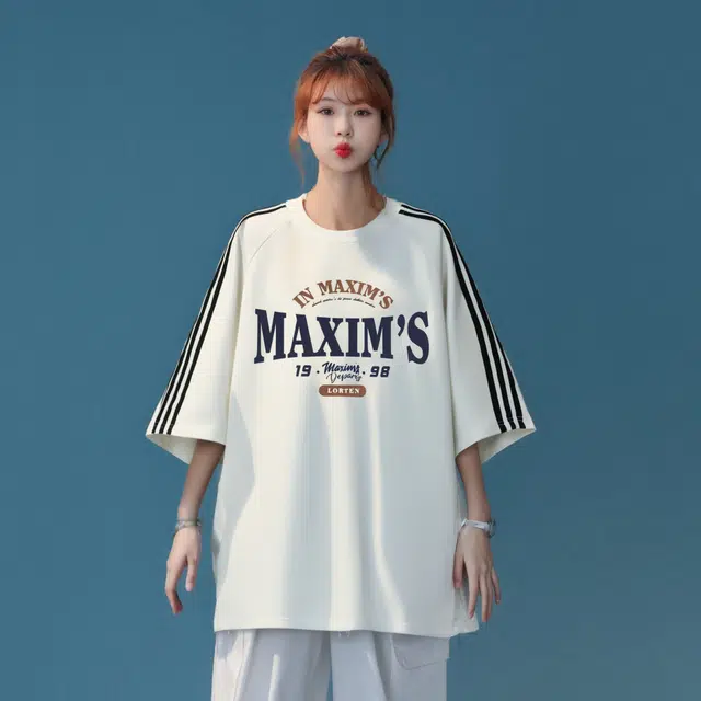 maxim's de paris logoT