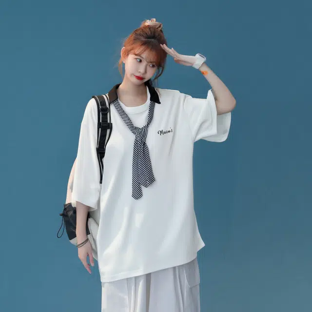 maxim's de paris logoT