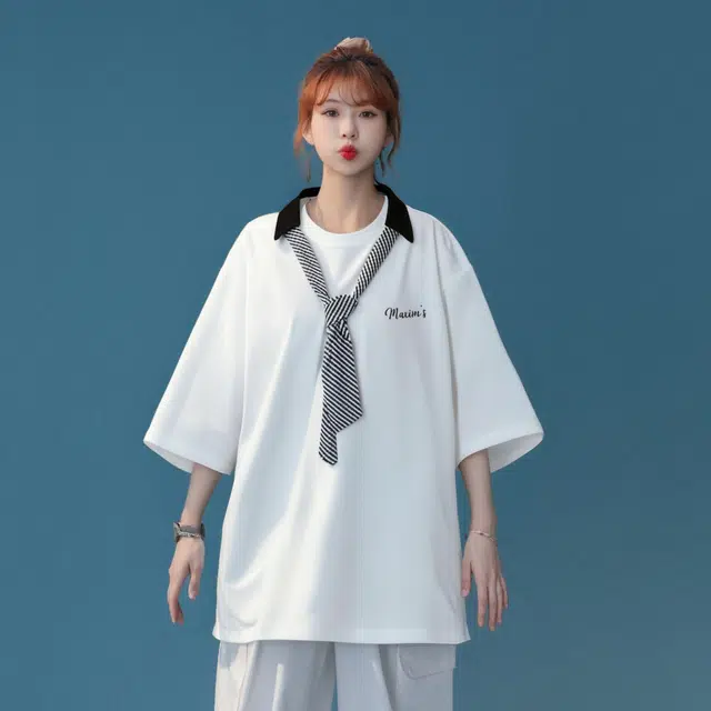 maxim's de paris logoT