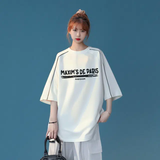 maxim's de paris logoT