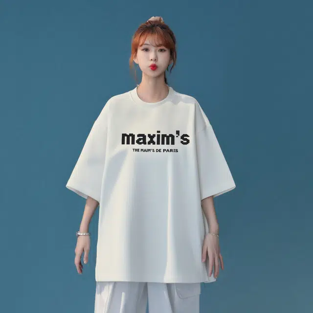 maxim's de paris logoT