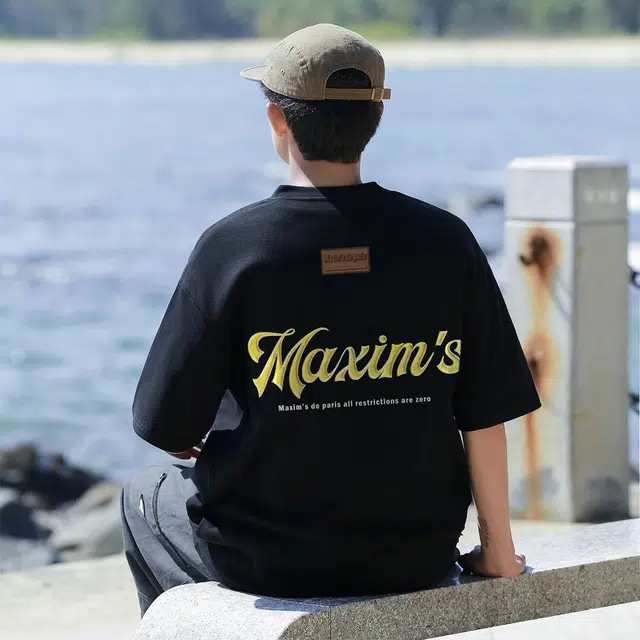 maxim's de paris LOGOT