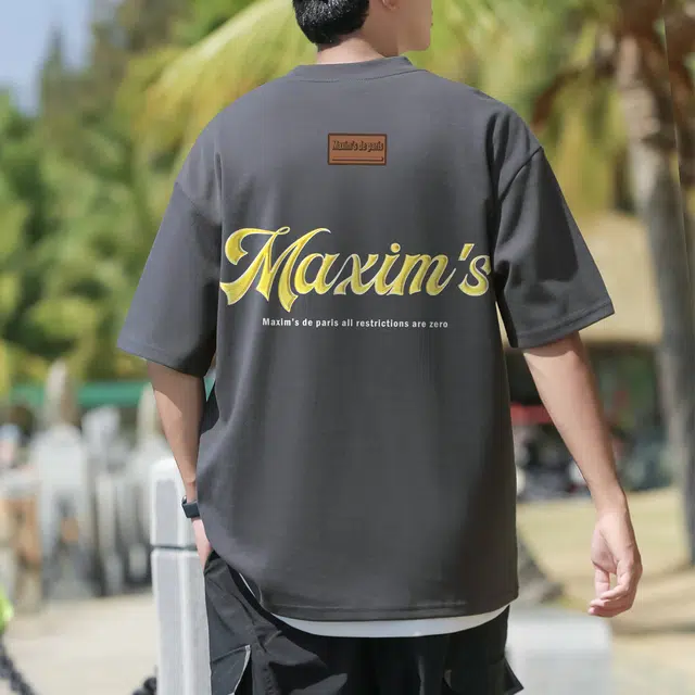 maxim's de paris LOGOT