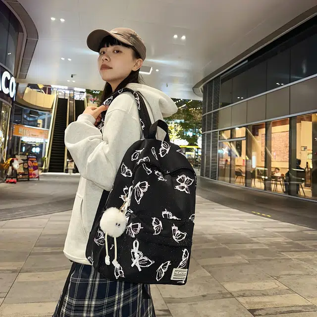 南潇湘 百搭防水纯色简约小清新初中生高中生大学生上课书包反光蝴蝶休闲背包 尼龙 双肩包 男女同款情侣款 黑色/绿色/米色/粉色/蓝色